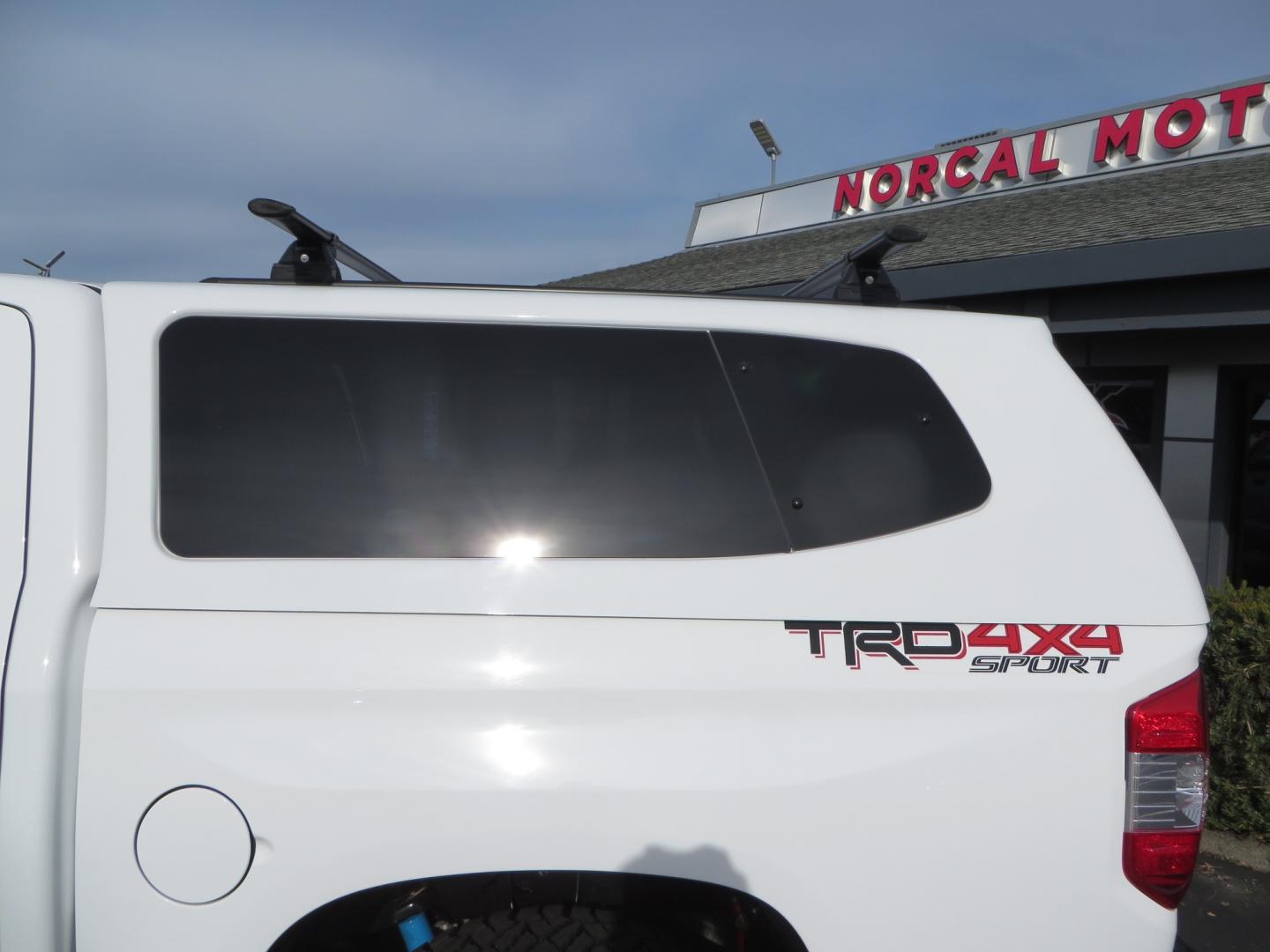 2019 White /BLACK Toyota Tundra SR5 5.7L V8 CrewMax 4WD (5TFDY5F19KX) with an 5.7L V8 DOHC 32V engine, 6A transmission, located at 2630 Grass Valley Highway, Auburn, CA, 95603, (530) 508-5100, 38.937893, -121.095482 - Clean leveled Tundra with 20" Fuel Maverick wheels, Nitto Ridge Grappler tires, N-Fab running boards, Snug Top camper shell with Yakima racks. - Photo#11